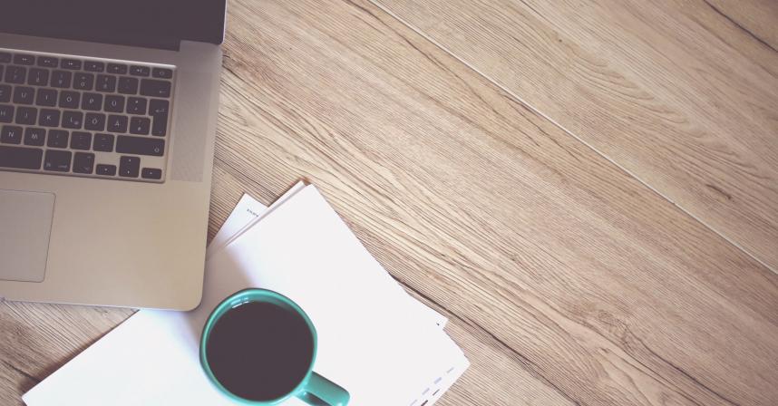 laptop and coffee on desk
